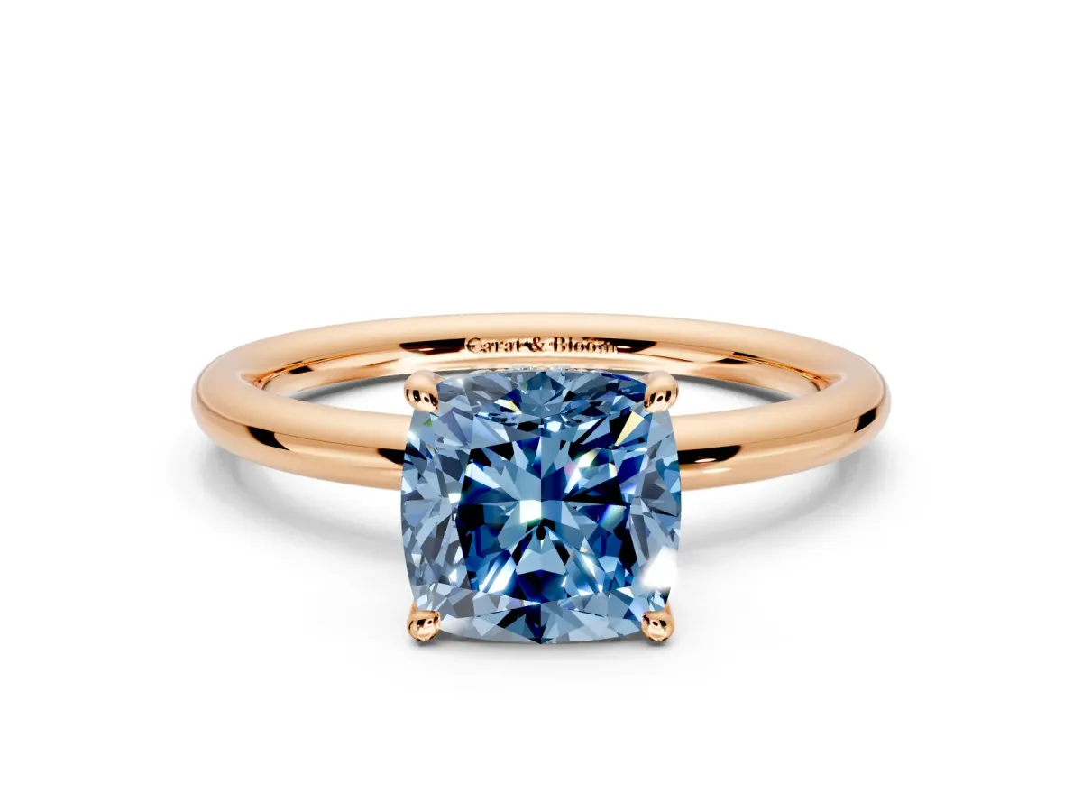 Hidden Halo Engagement Ring Setting for Fancy Blue Cushion Cut Center with Thin Rounded Band and Prong Head in Rose Gold