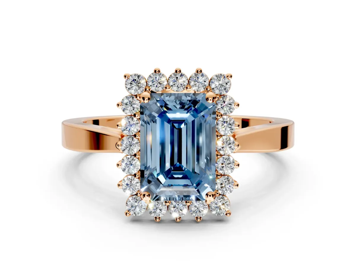 Starburst Halo Engagement Ring Setting for Fancy Blue Emerald Cut Center with Flat Cathedral Band and Prong Head in Rose Gold