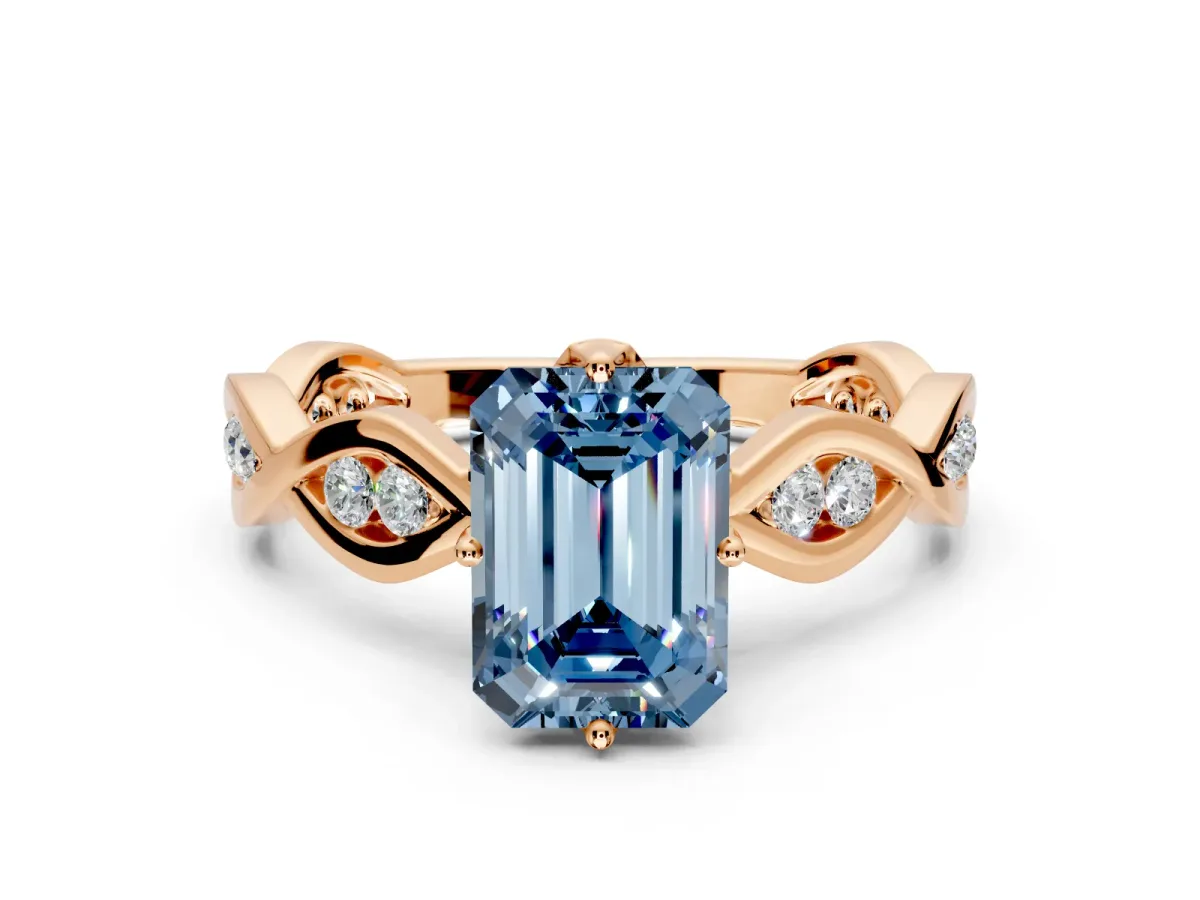 Solitaire Engagement Ring Setting for Fancy Blue Emerald Cut Center with Accented Twist Band and Leaf Prong Head in Rose Gold