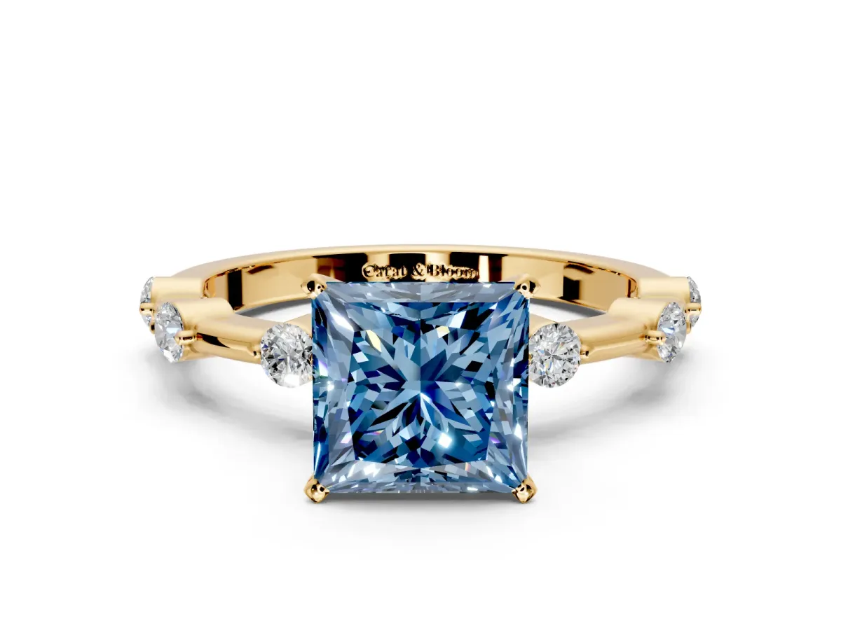 Solitaire Engagement Ring Setting for Fancy Blue Princess Cut Center with Bezel Station Band and Prong Head in Yellow Gold