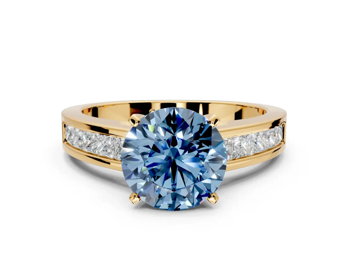 Solitaire Engagement Ring Setting for Fancy Blue Round Cut Center with Princess Cut Channel Band and Prong Head in Yellow Gold