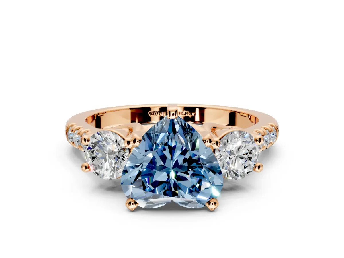 3 Stone Engagement Ring Setting for Fancy Blue Heart-Shaped Center with Crossover Basket, Pave Band and Prong Head in Rose Gold