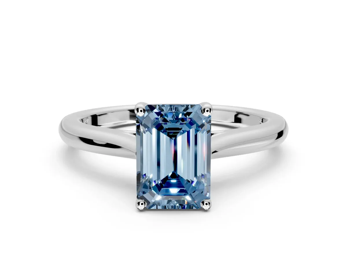 Solitaire Engagement Ring Setting for Fancy Blue Emerald Cut Center with Narrow Cathedral Band and Prong Head in Platinum