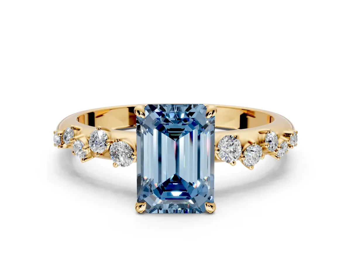 Cluster Engagement Ring Setting for Fancy Blue Emerald Cut Center with Round Cut Accent Band and Prong Head in Yellow Gold