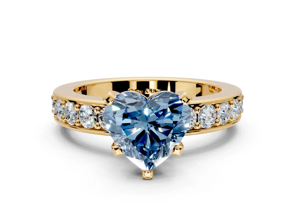 Solitaire Engagement Ring Setting for Fancy Blue Heart-Shaped Center with Channel-Set Accents and Prong Head in Yellow Gold