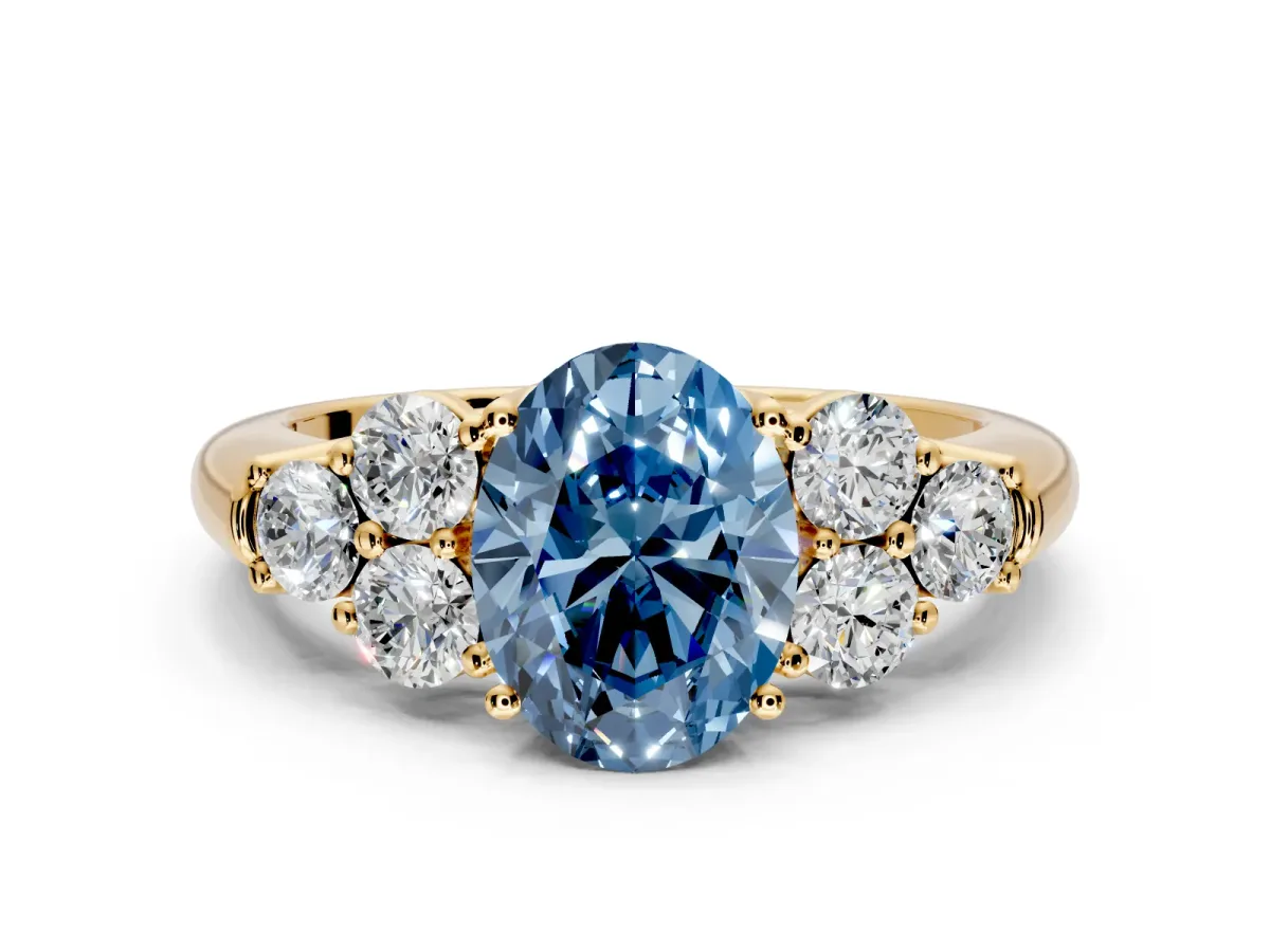 Cluster Engagement Ring Setting for Fancy Blue Oval Center with Round Cut Accent Frame and Prong Head in Yellow Gold