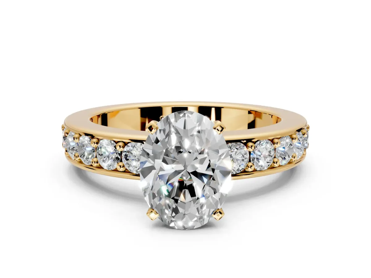 Solitaire Engagement Ring Setting for Oval Center with Channel-Set Accents and Prong Head in Yellow Gold