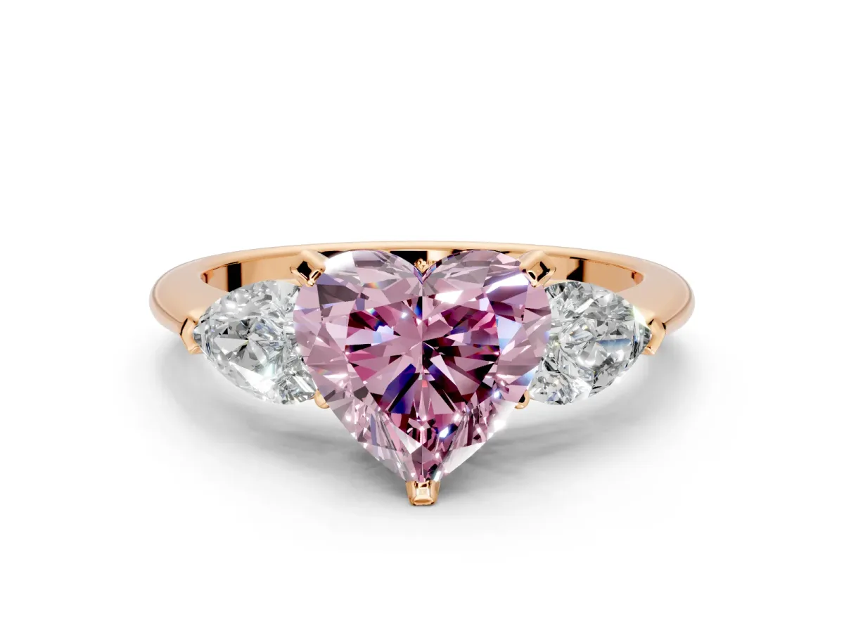 3 Stone Engagement Ring Setting for Fancy Pink Heart-Shaped Center with Large Pear-Shaped Accents and Prong Head in Rose Gold
