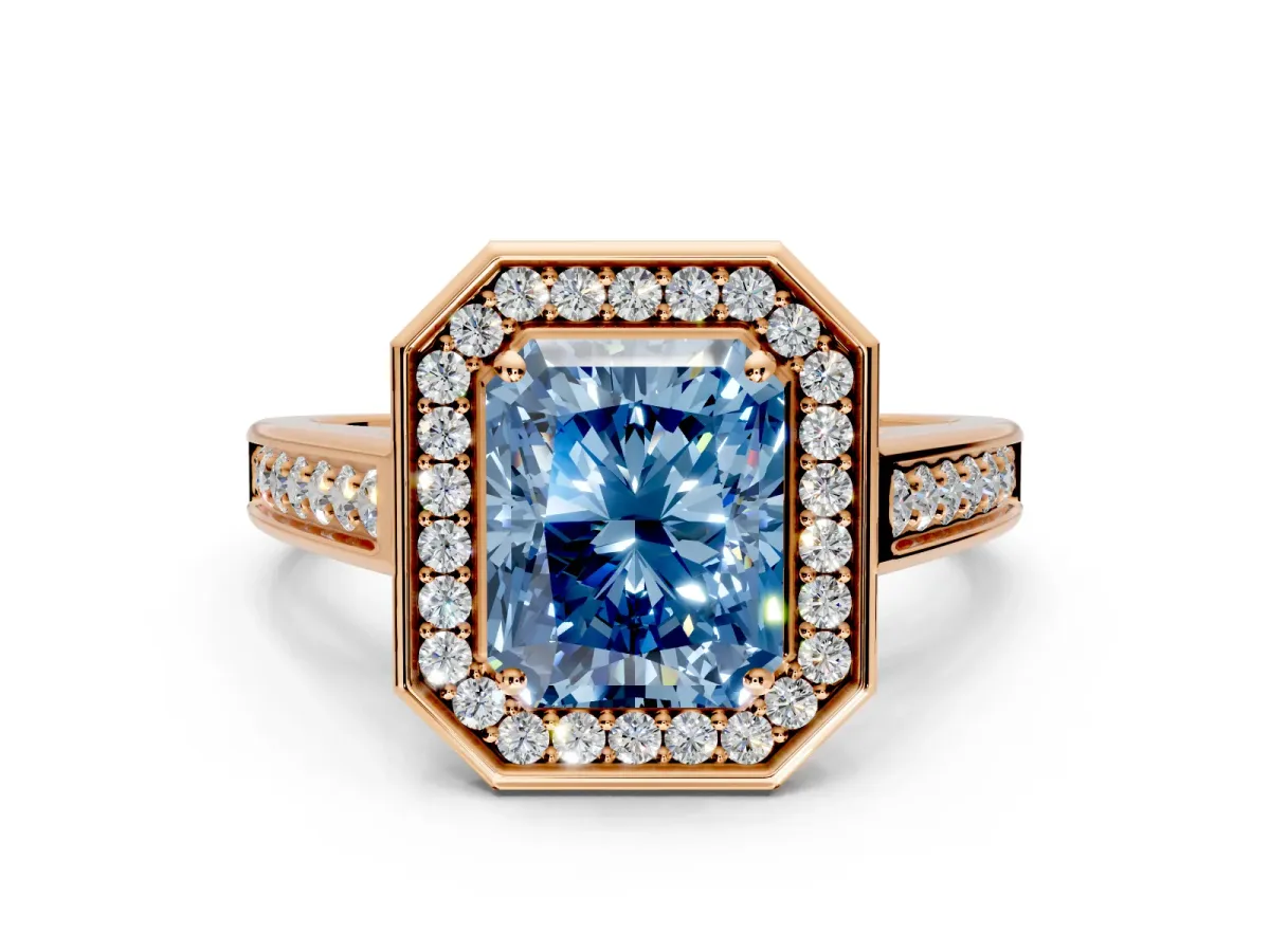 Halo Engagement Ring Setting for Fancy Blue Radiant Cut Center with Outer Bezel Rim, Pave Band and Prong Head in Rose Gold