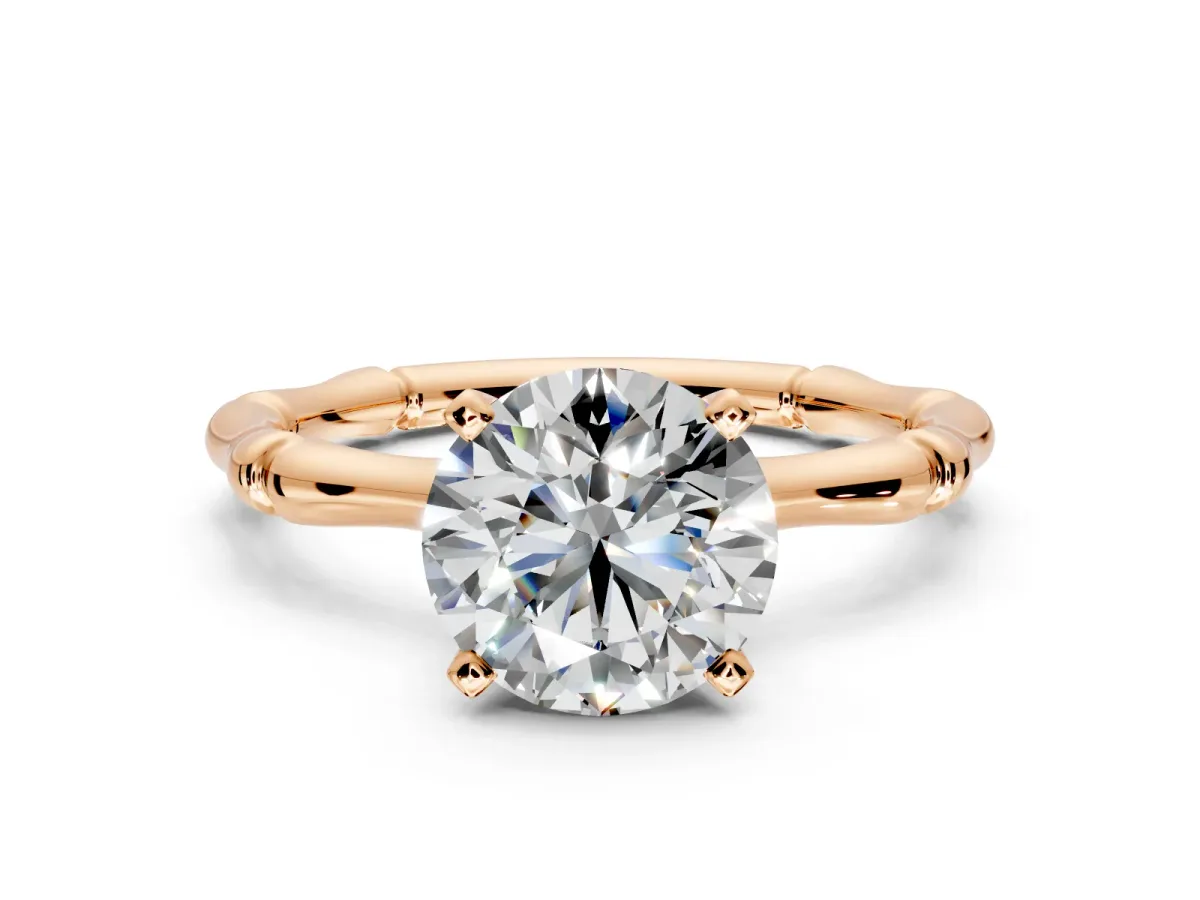 Solitaire Engagement Ring Setting for Round Cut Center with Bamboo Band and Prong Head in Rose Gold