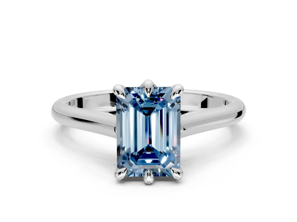 Solitaire Engagement Ring Setting for Fancy Blue Emerald Cut Center with Cathedral Band and Prong Head in White Gold