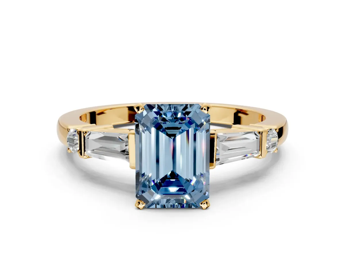 Bar-Set Engagement Ring Setting for Fancy Blue Emerald Cut Center with Tapered Baguette Accents and Prong Head in Yellow Gold