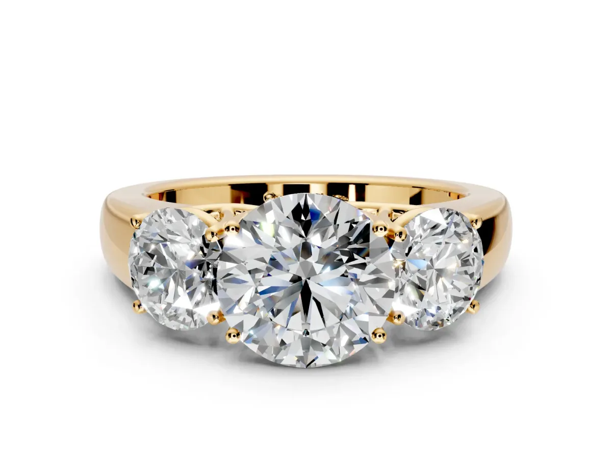 3 Stone Engagement Ring Setting for Round Cut Center with Raised Basket Heads and Prong Head in Yellow Gold