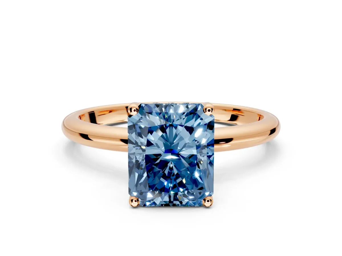 Hidden Halo Engagement Ring Setting for Fancy Blue Radiant Cut Center with Thin Round-Wire Band and Prong Head in Rose Gold