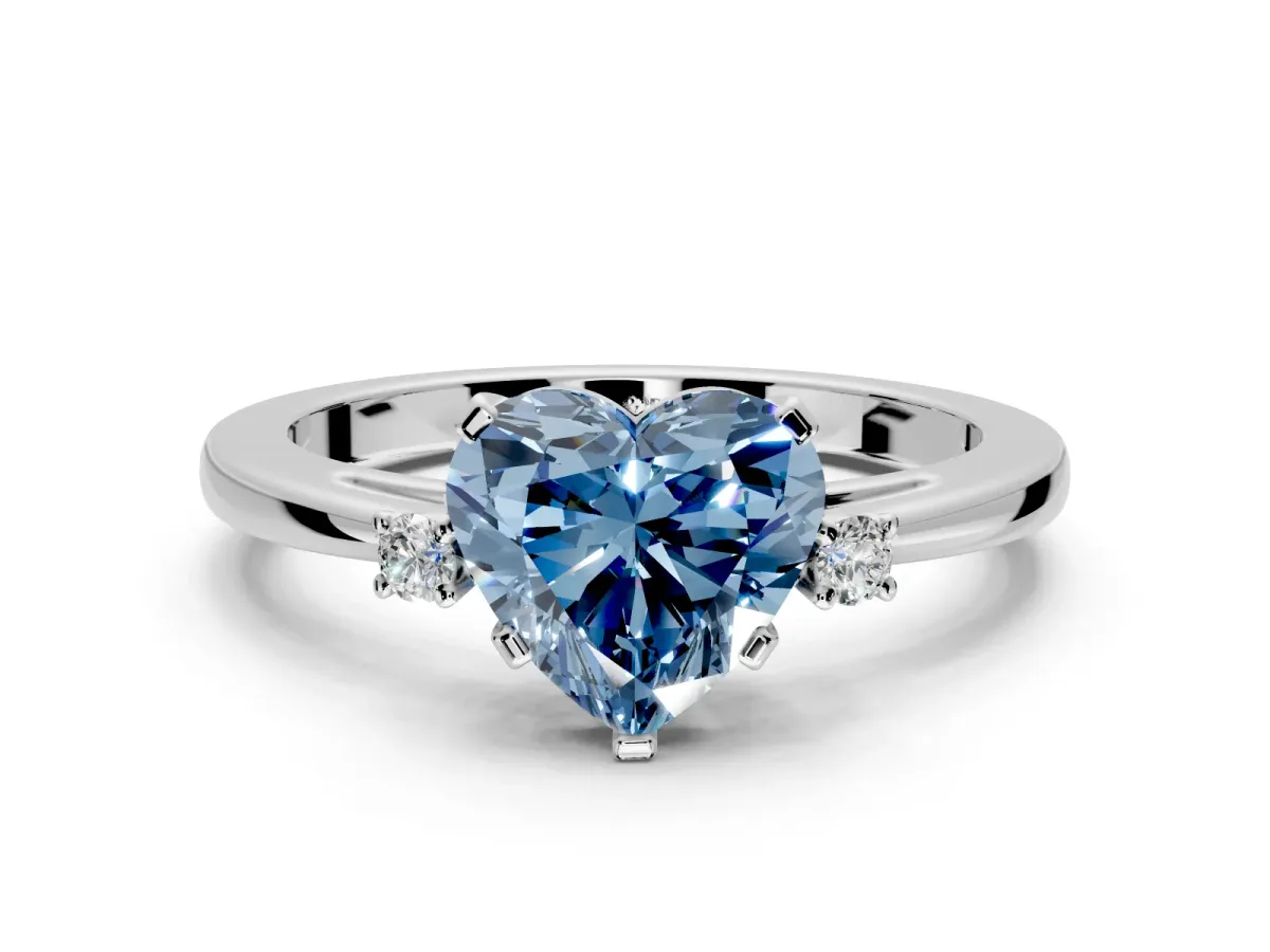 3 Stone Engagement Ring Setting for Fancy Blue Heart-Shaped Center with Low-Set Round Cut Accents and Prong Head in White Gold