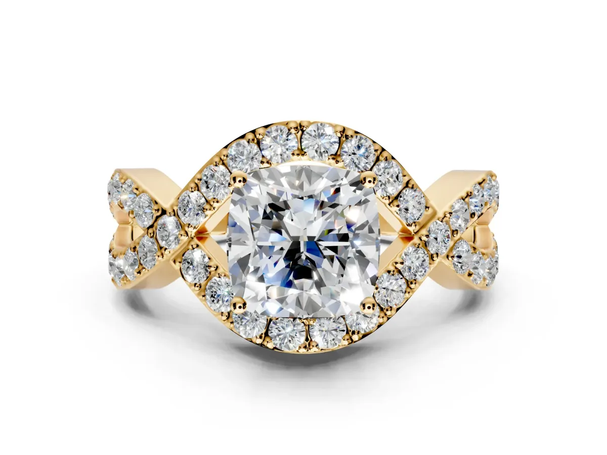 Halo Engagement Ring Setting for Cushion Cut Center with Pave Infinity Twist Band and Prong Head in Yellow Gold