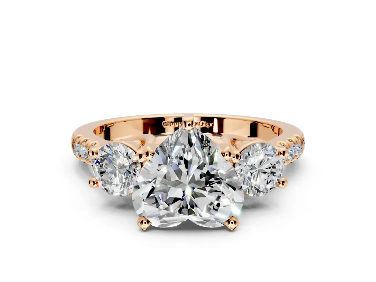 3 Stone Engagement Ring Setting for Heart-Shaped Center with Crossover Basket, Pave Band and Prong Head in Rose Gold