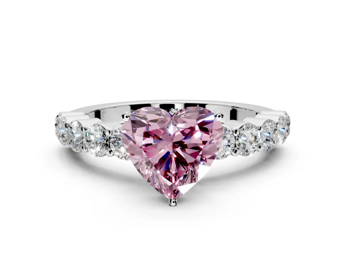 Shared-Prong Engagement Ring Setting for Fancy Pink Heart-Shaped Center with Graduated Accents and Prong Head in Platinum