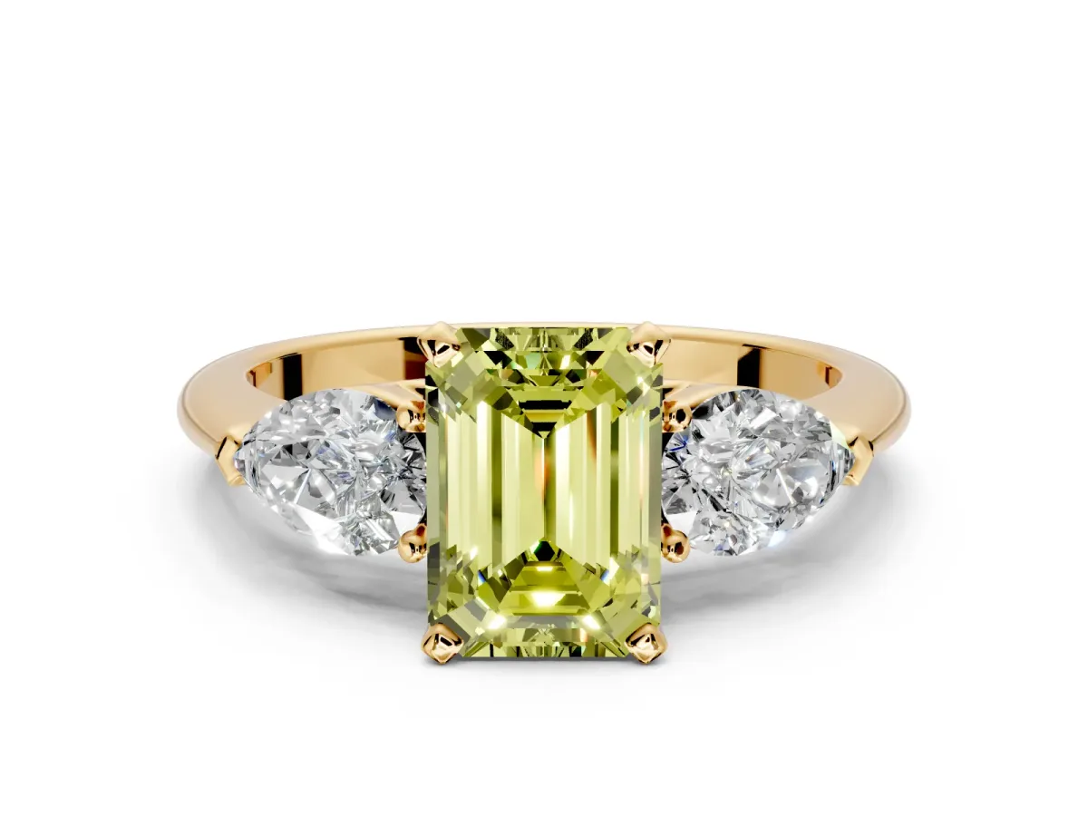 3 Stone Engagement Ring Setting for Fancy Yellow Emerald Cut Center with Large Pear-Shaped Accents and Prong Head in Yellow Gold