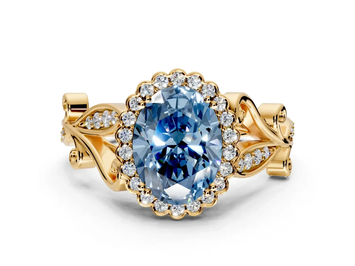 Halo Engagement Ring Setting for Fancy Blue Oval Center with Leaf Motif Split Shank and Prong Head in Yellow Gold