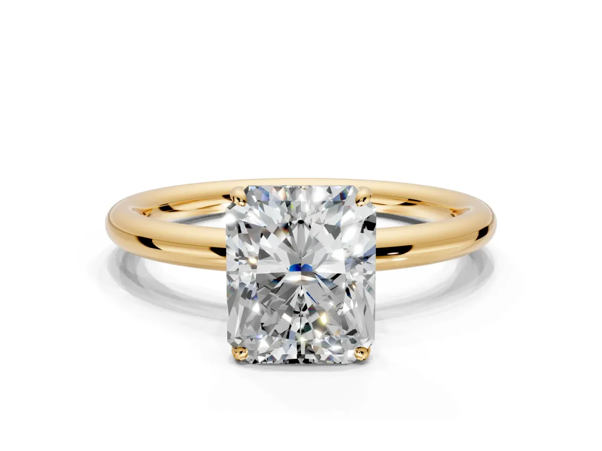 Low-Set Solitaire Engagement Ring Setting for Radiant Cut Center with Thin Plain Band and Prong Head in Yellow Gold