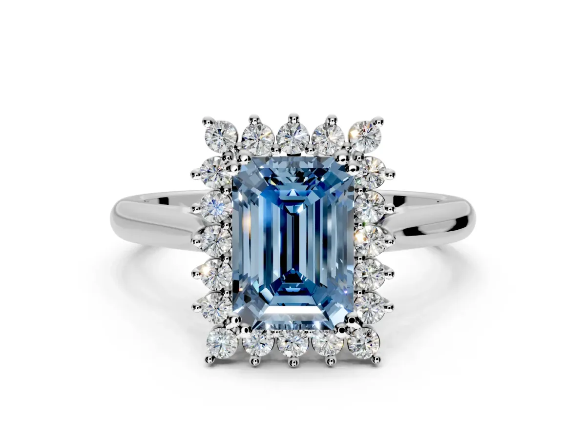 Starburst Halo Engagement Ring Setting for Fancy Blue Emerald Cut Center with Thin Round-Wire Band and Prong Head in Sterling Silver