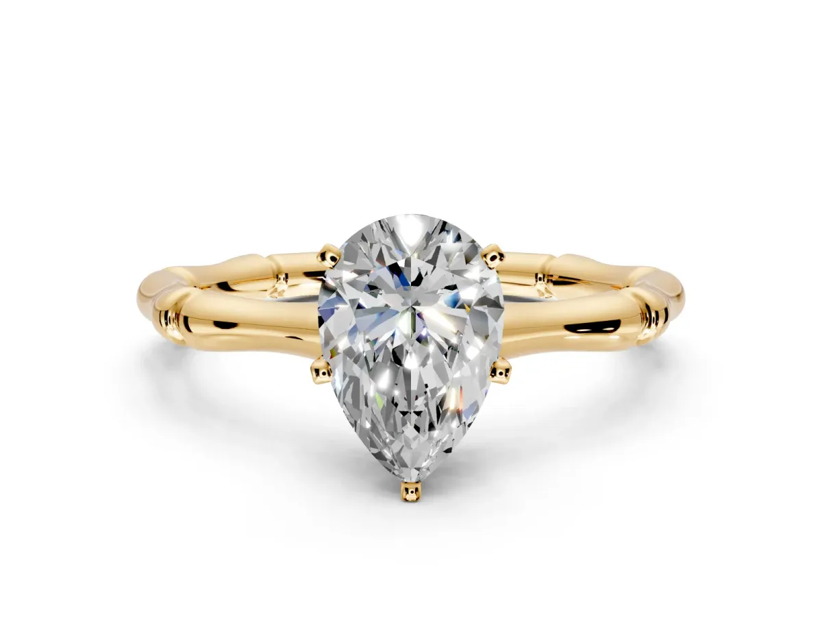 Solitaire Engagement Ring Setting for Pear-Shaped Center with Bamboo Band and Prong Head in Yellow Gold