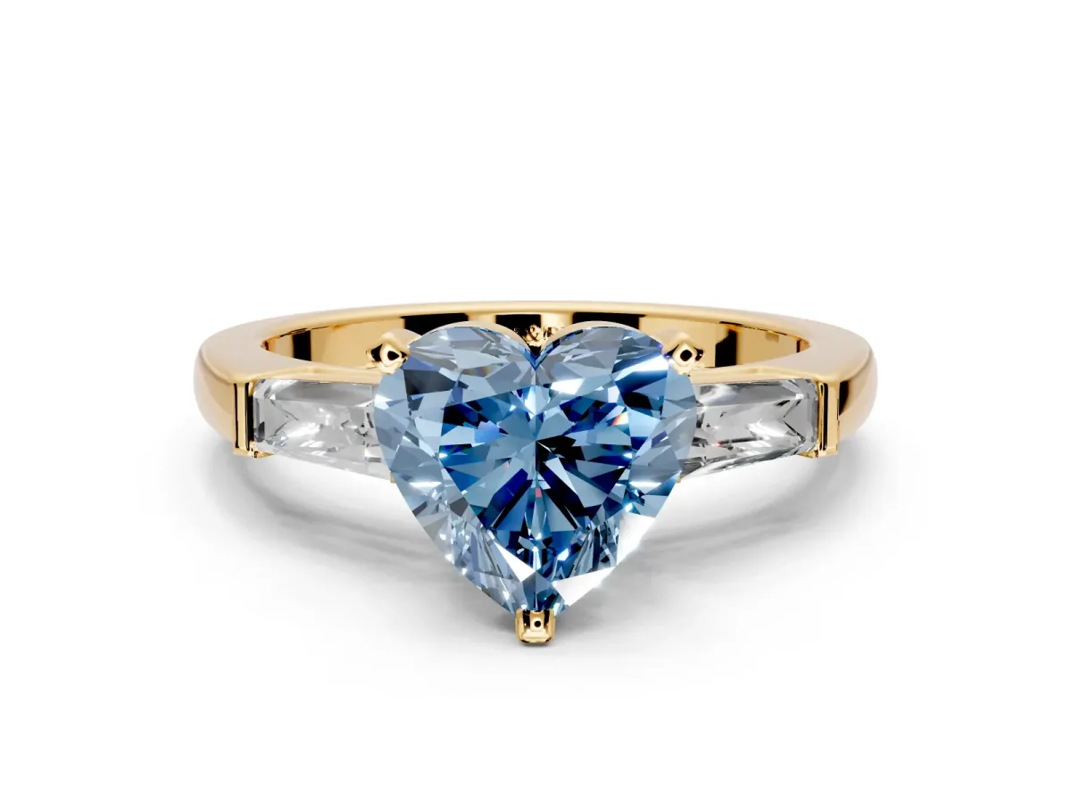 3 Stone Engagement Ring Setting for Fancy Blue Heart-Shaped Center with Tapered Baguettes, Plain Band and Prong Head in Yellow Gold