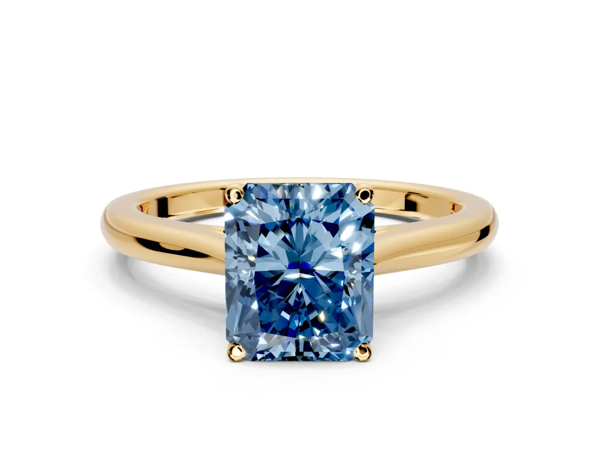 Solitaire Engagement Ring Setting for Fancy Blue Radiant Cut Center with Narrow Cathedral Band and Prong Head in Yellow Gold