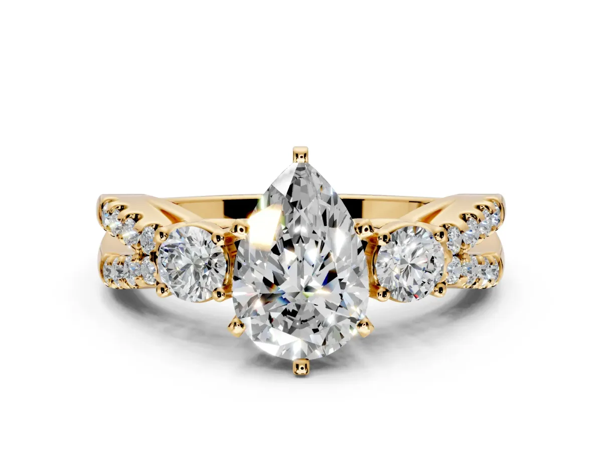 3 Stone Engagement Ring Setting for Pear-Shaped Center with Pave Split Shank and Prong Head in Yellow Gold