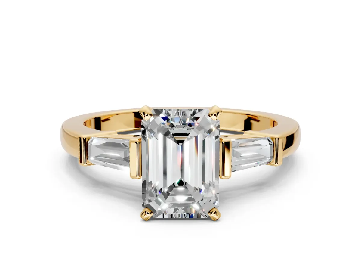 3 Stone Engagement Ring Setting for Emerald Cut Center with Channel Baguette Accents and Prong Head in Yellow Gold