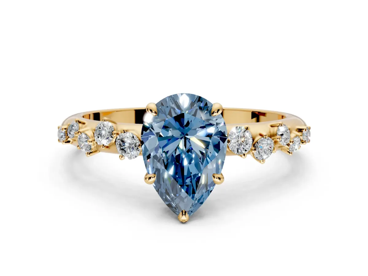 Cluster Engagement Ring Setting for Fancy Blue Pear-Shaped Center with Round Cut Accent Band and Prong Head in Yellow Gold