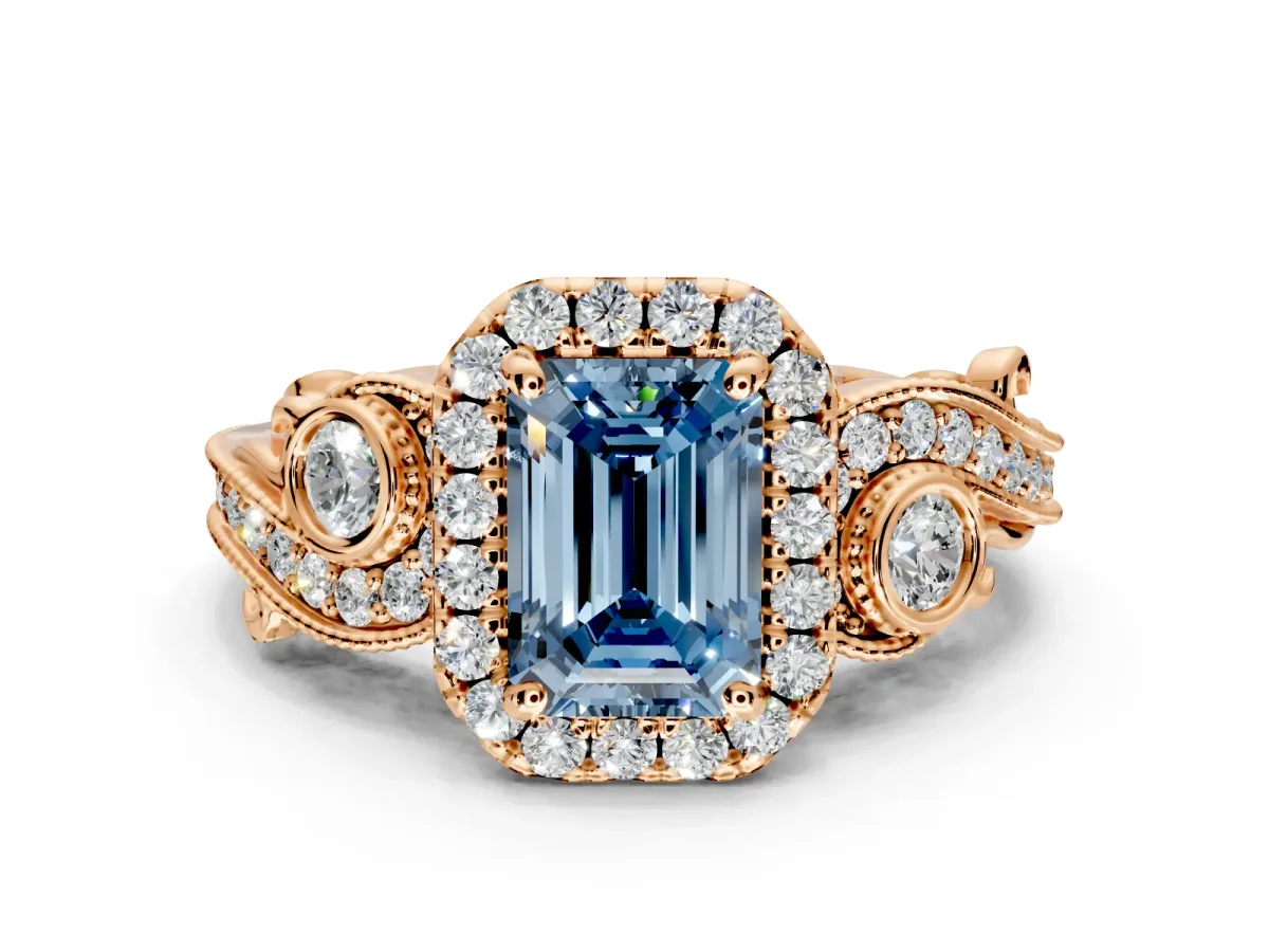 Milgrain Halo Engagement Ring Setting for Fancy Blue Emerald Cut Center with Shoulder Bezels and Prong Head in Rose Gold