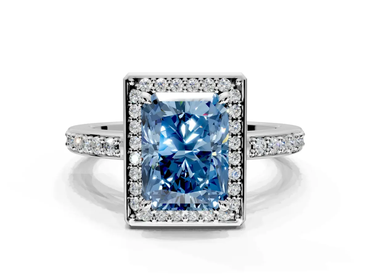 Halo Engagement Ring Setting for Fancy Blue Radiant Cut Center with Metal-Rimmed Halo, Pave Band and Prong Head in Platinum