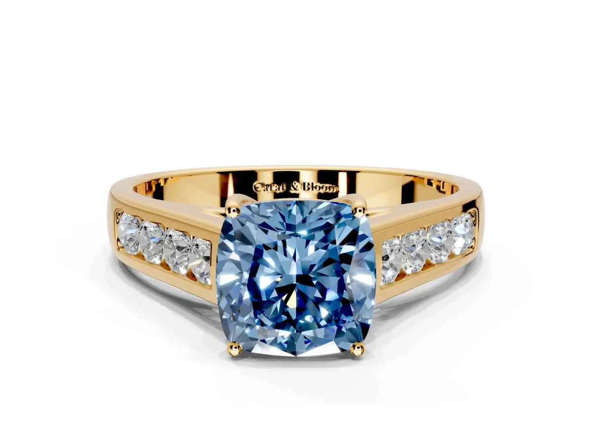 Solitaire Engagement Ring Setting for Fancy Blue Cushion Cut Center with Round Cut Channel Band and Prong Head in Yellow Gold