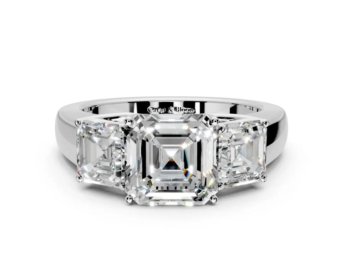 3 Stone Engagement Ring Setting for Asscher Cut Center with Raised Basket Heads and Prong Head in Platinum