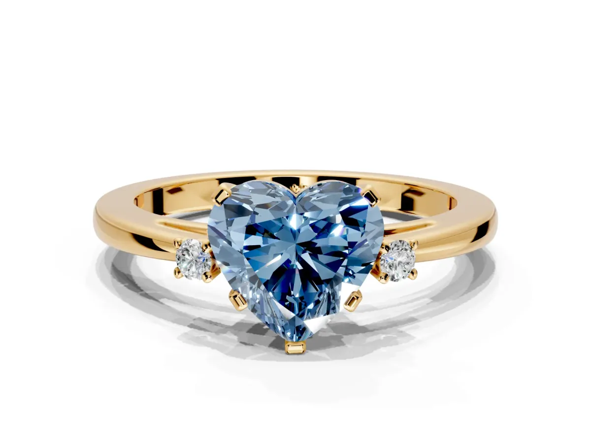 3 Stone Engagement Ring Setting for Fancy Blue Heart-Shaped Center with Low-Set Round Cut Accents and Prong Head in Yellow Gold