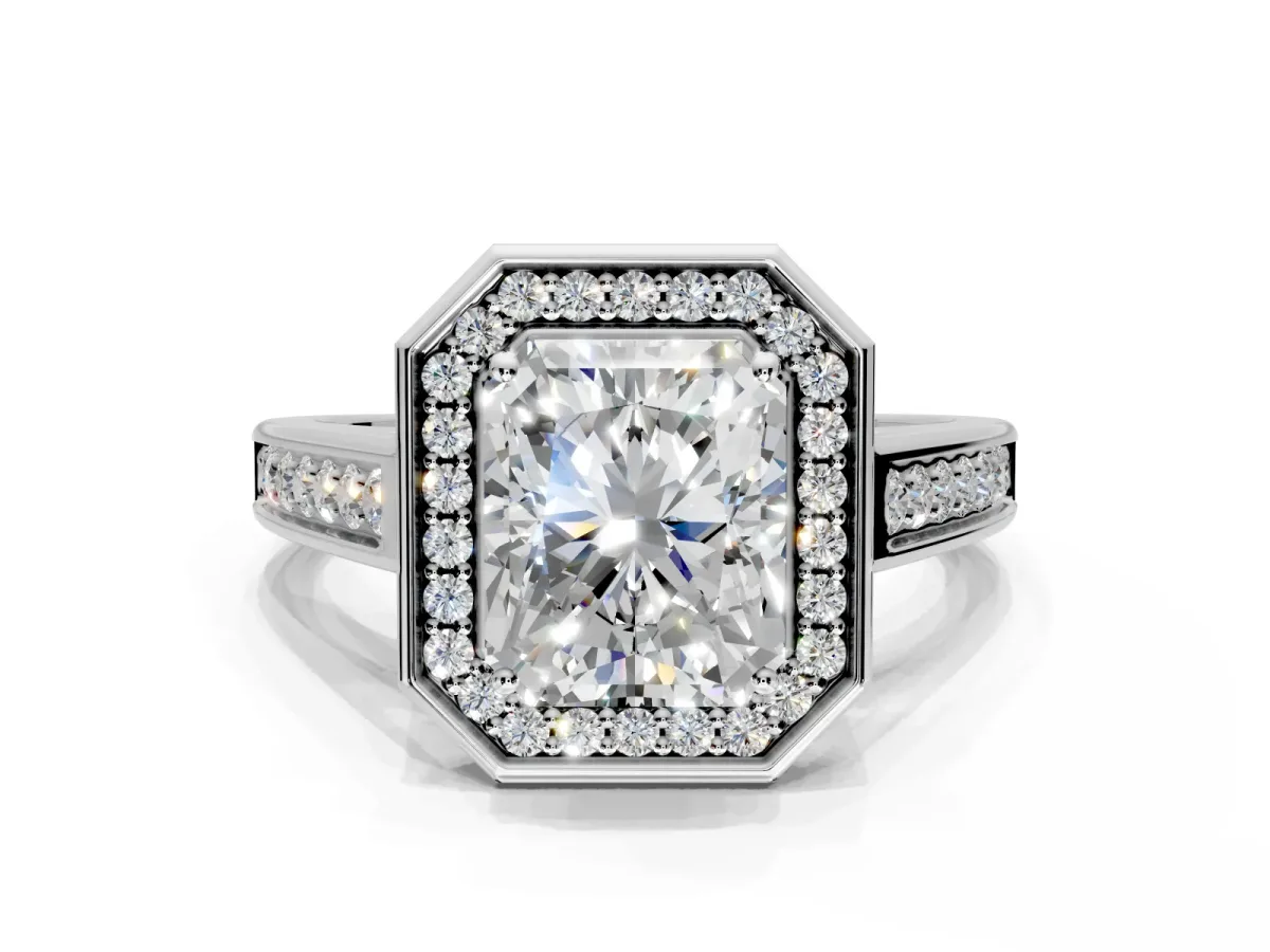 Halo Engagement Ring Setting for Emerald Cut Center with Outer Bezel Rim, Pave Band and Prong Head in Platinum