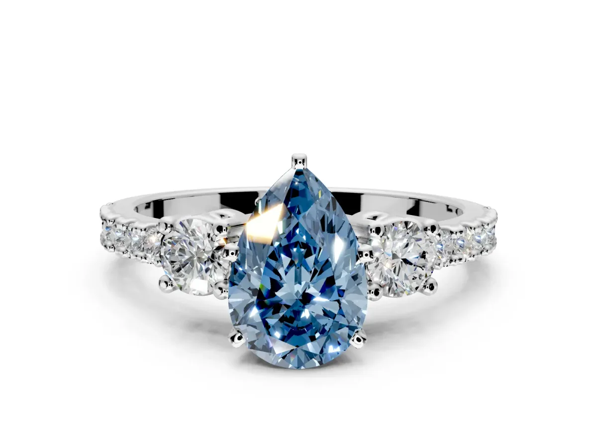 3 Stone Engagement Ring Setting for Fancy Blue Pear-Shaped Center with Round Cut Side Accents and Prong Head in Sterling Silver
