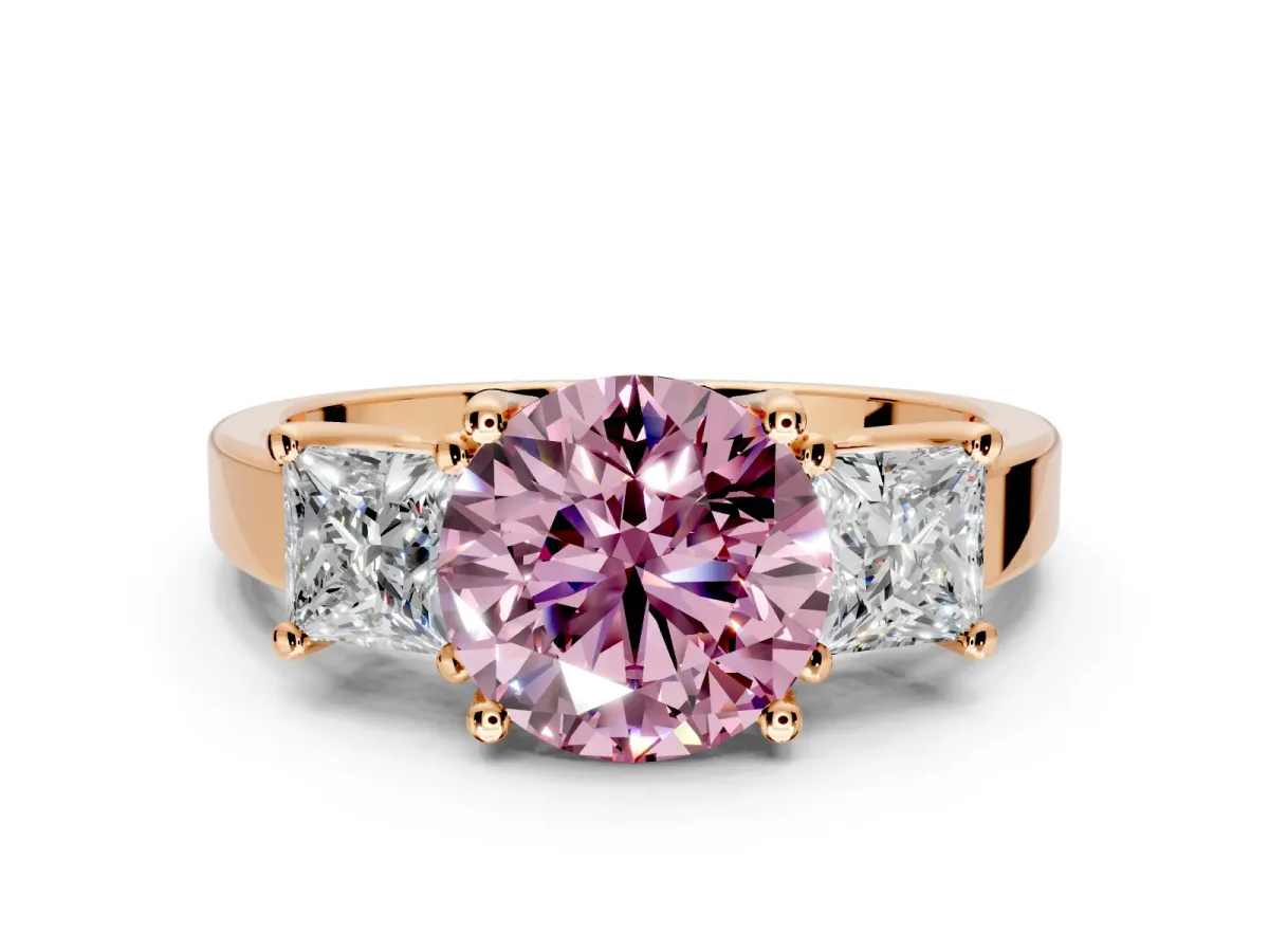 3 Stone Engagement Ring Setting for Fancy Pink Round Cut Center with Matching Side Accents and Prong Head in Rose Gold