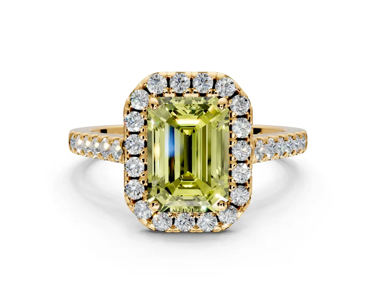 Halo Engagement Ring Setting for Fancy Yellow Emerald Cut Center with Narrowing Pave Band and Prong Head in Yellow Gold