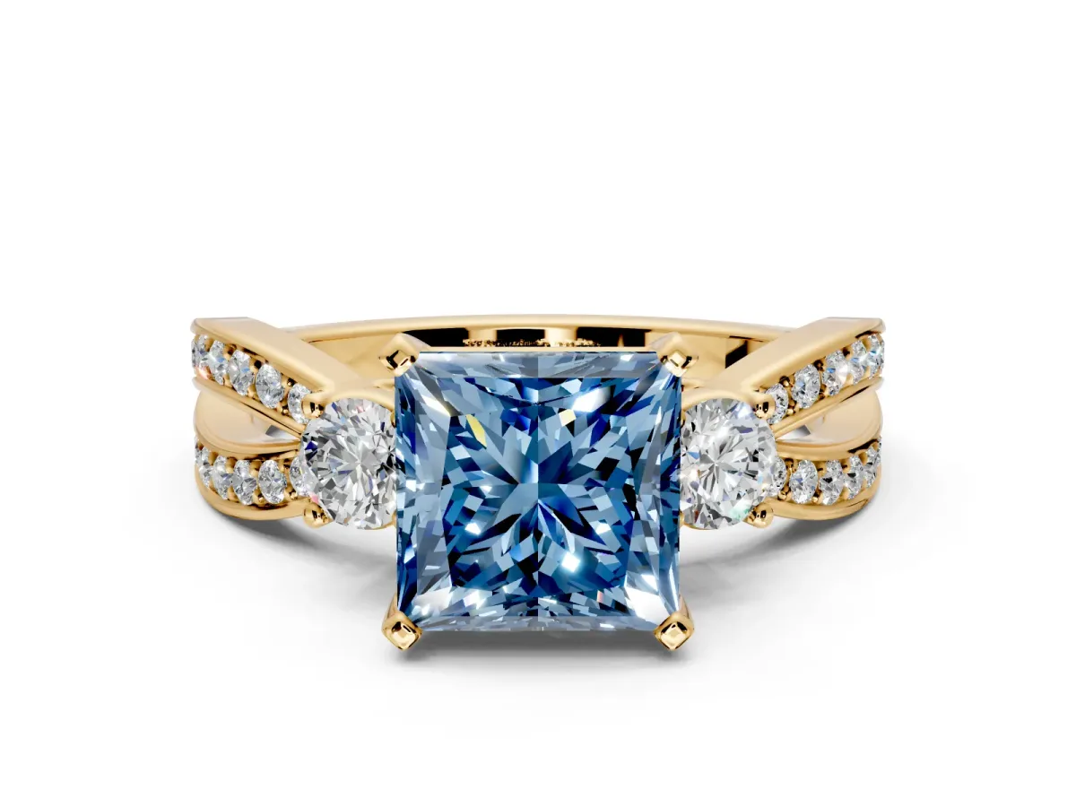 3 Stone Engagement Ring Setting for Fancy Blue Princess Cut Center with Pave Twist Band and Prong Head in Yellow Gold