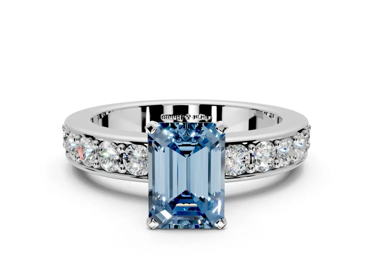 Solitaire Engagement Ring Setting for Fancy Blue Emerald Cut Center with Channel-Set Accents and Prong Head in Platinum
