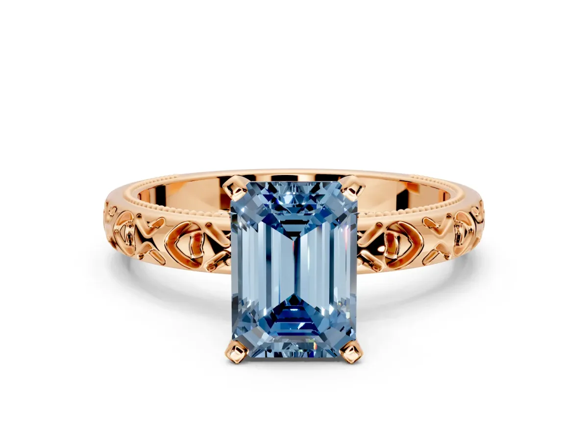 Solitaire Engagement Ring Setting for Fancy Blue Emerald Cut Center with XO Engraved Band and Prong Head in Rose Gold