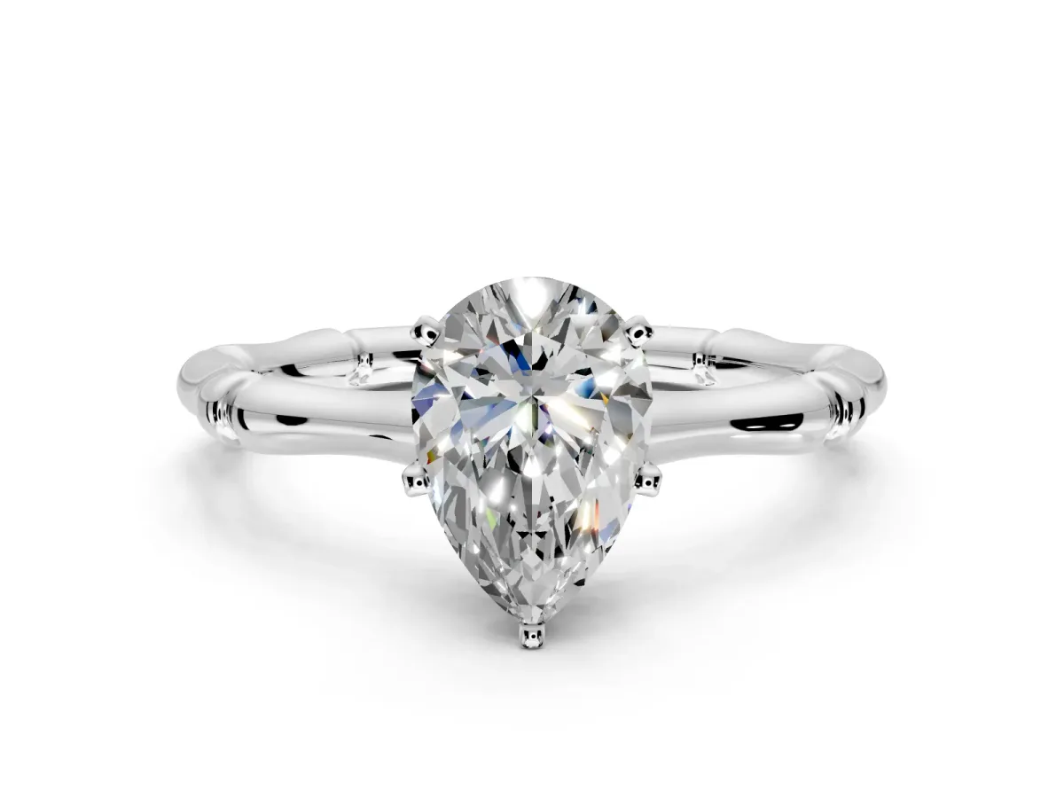 Solitaire Engagement Ring Setting for Pear-Shaped Center with Bamboo Band and Prong Head in Platinum