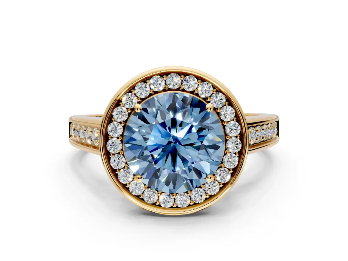 Halo Engagement Ring Setting for Fancy Blue Round Cut Center with Outer Bezel Rim, Pave Band and Prong Head in Yellow Gold