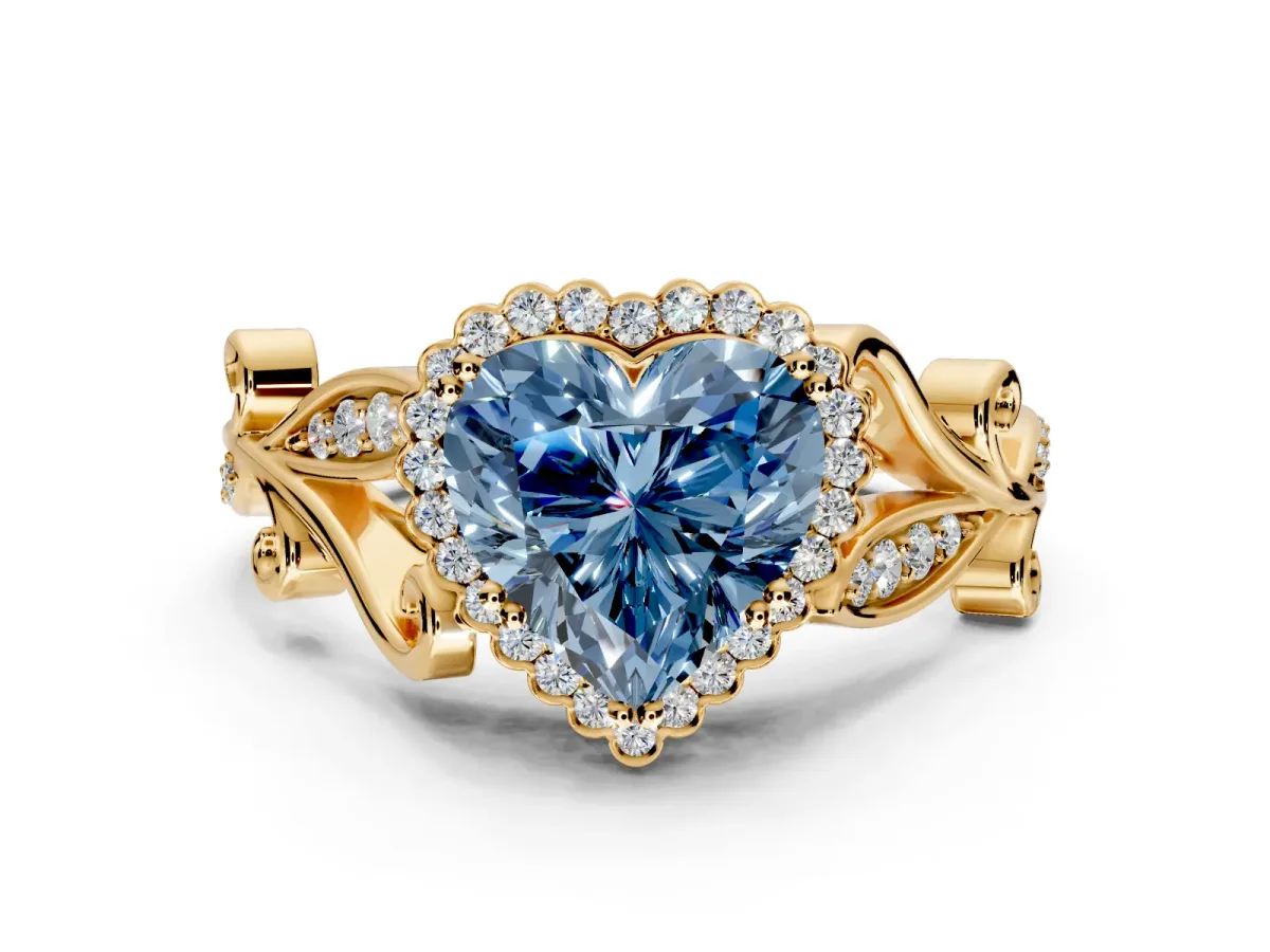 Halo Engagement Ring Setting for Fancy Blue Heart-Shaped Center with Leaf Motif Split Shank and Prong Head in Yellow Gold