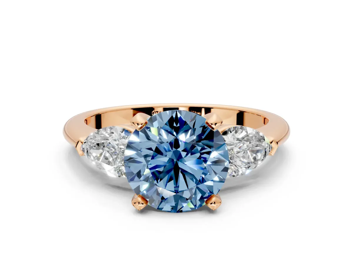 3 Stone Engagement Ring Setting for Fancy Blue Round Cut Center with Large Pear-Shaped Accents and Prong Head in Rose Gold