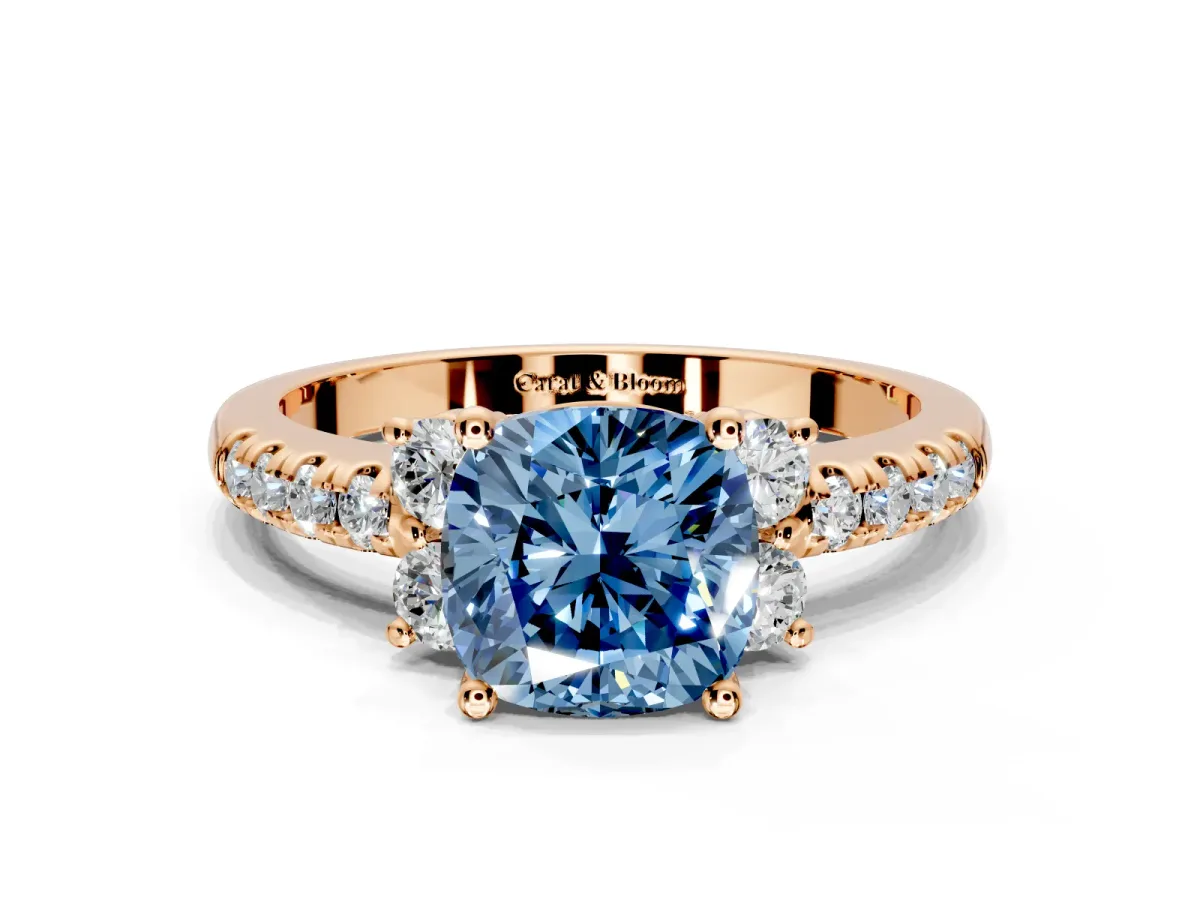 Paired Accent Engagement Ring Setting for Fancy Blue Cushion Cut Center with Pave Band and Prong Head in Rose Gold