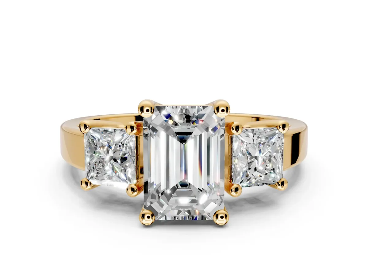 3 Stone Engagement Ring Setting for Emerald Cut Center with Matching Side Accents and Prong Head in Yellow Gold